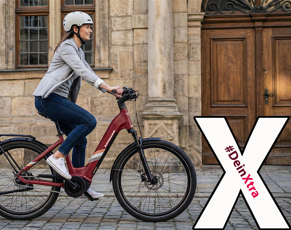 © Zündapp #deinxtra | Bild zeigt eine Frau auf dem Fahhrrad. | © Zündapp